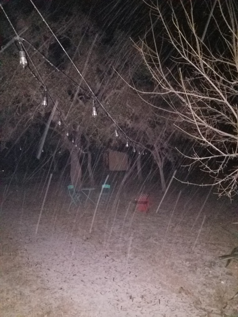 Picture of snowfall at about 09:30 PM near Bandera,  Texas on February 14th.